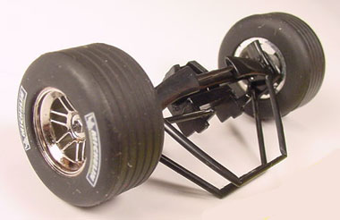 Sloting Plus SP40216009 - Universal Front Wheels - Press-on Plastic - 16 x 9mm - pair